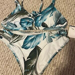 Two NWT bikini sets